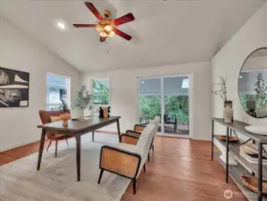 Bright home office with vaulted ceiling and serene outdoor views