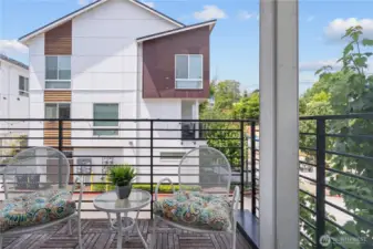 Start your morning with coffee on the patio, overlooking the peaceful community courtyard and lush greenery.