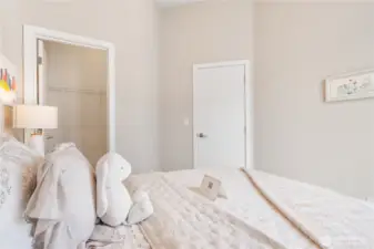 Bedroom 1 with a walk-in closet
