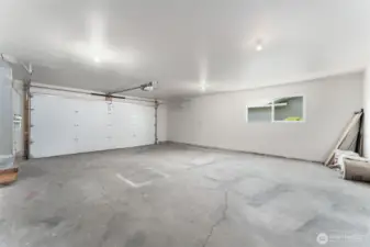 Spacious garage with a crisp, freshly finished interior—perfect for parking, storage, or a workshop