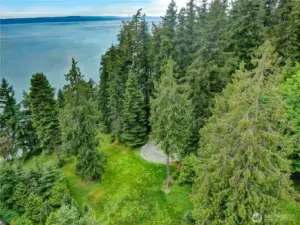 Beautiful coastal mainland property with natural landscape insures privacy.
