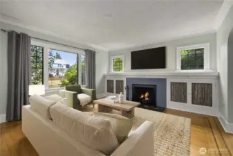 Large east-facing windows flood living room with light