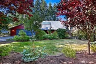 Edgemoor at it's best!  This home is freshly painted and situated to take advantage of the sunlight, professional landscaping, nature, and water views from upper level bedroom.