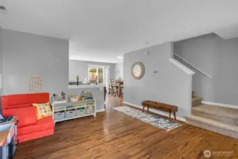 Access to the upper floor, family room & kitchen.