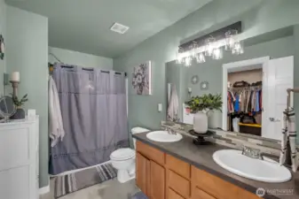 Primary bedroom bath. Double sinks and great walk in closet.