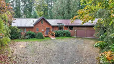 Lindal Cedar Home on .86 of an acre with oversized garage, covered RV parking, Gazebo, potting shed. Walking distance to Nolte State Park and Fish Lake.