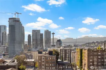 Gorgeous views and sunsets from these three west facing balconies. Space Needle, Puget Sound/Elliott Bay & Olympic mountain range.