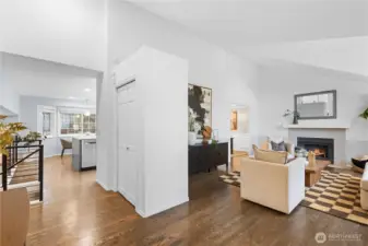 Stunning oak floors flow throughout the main level; the foyer blends into the Formal Living Room.