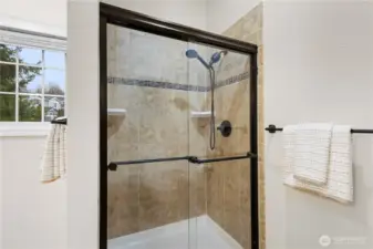 A photo of the shower in the primary bath.