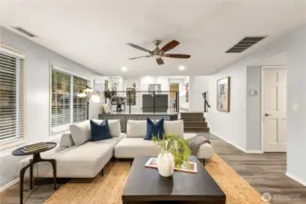 Offering a ceiling fan, tons of storage and large picture windows to bring the light in.