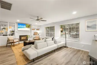The built-ins by the staircase and surrounding the fireplace are nice to have. The gas fireplace is a focal point for the room.