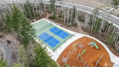 Nearby pickleball courts and neighborhood playground within McCormick Trails, offering active outdoor living and community amenities just moments from this newer construction home in Port Orchard.