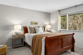 Primary bedroom with en-suite bath and walk in closet