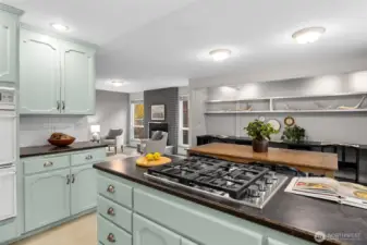 New gas range is perfectly situated to enjoy the open concept floorplan