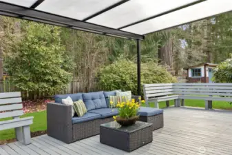 The expansive covered back deck extends living space to the outdoors