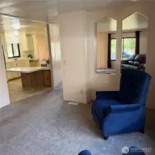 Sitting area looking back towards kitchen and living room