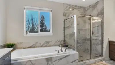 Soak the day away in this large tub or walk-in shower.