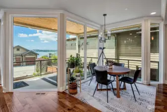 Breakfast nook off the kitchen and family room, overlooking the deck and views.