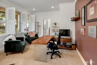 Main Floor Bedroom with ensuite 3/4 bath, currently staged as office.