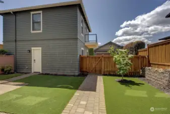 Back Yard from daylight basement to garage.