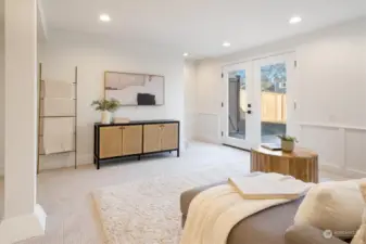 Laundry Room and water heater in back left corner. Additional storage space.