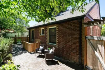Multiple seating areas in the terraced & beautifully landscaped back yard