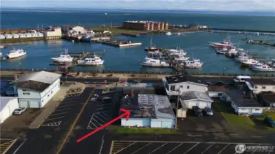 Just across the street from the Marina with public parking in the front, rear and side
