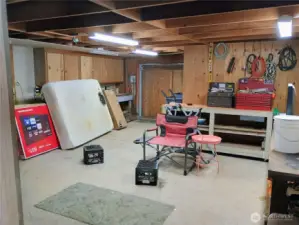 Shop has a sliding door and could be a 3rd parking space