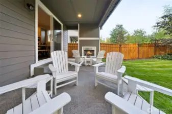 Covered patio with gas fireplace and gas hook up for grill