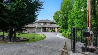 Welcome Home to your Lake Martha oasis!  Gated Driveway