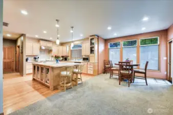Eating area with door to the back deck and then down the landscaped yard, to your private dock