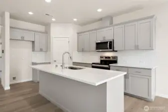 Photos are of lot 44 at Star Lake Crossing.