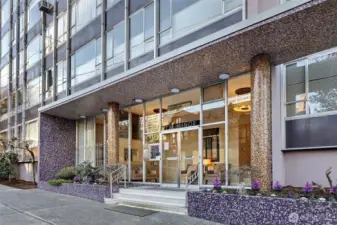 Welcome to Sutton Place. A classic glass entry with original mosaic detailing, set in the heart of First Hill.