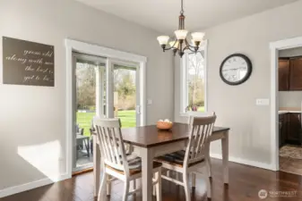 Dining area and slider leading to patio