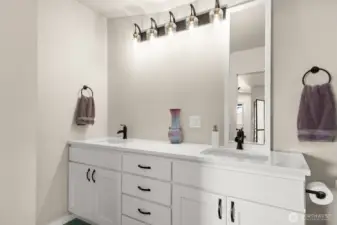 MIL Bathroom with quartz counters