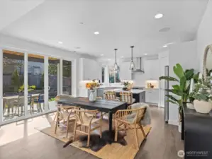 Generous dining room opens to the covered patio
