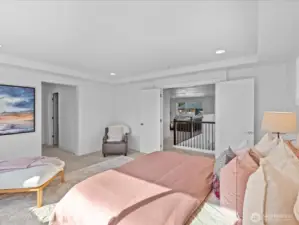 Luxurious primary bedroom suite