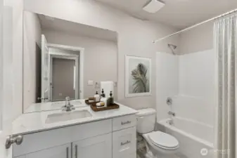 Guest Bathroom. Photos not of actual home. This is the same plan virtually staged. Plan, Colors, and options package may vary on actual home.