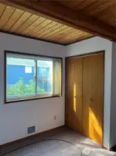Second guest bedroom also with warm wood ceilings. You will find wood ceilings in every room on the main floor...