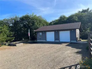 Built min 2012, 816 sq. ft. double garage and separate heated workshop. Cement exterior siding for low maintenance.