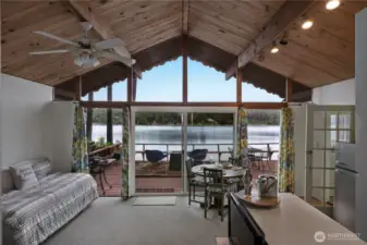 Open living area with vaulted ceiling.