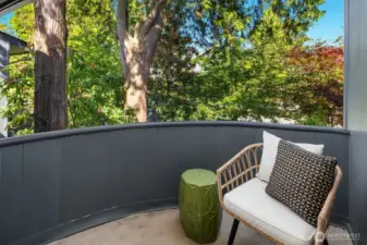 Grab a cup of coffee and enjoy solitude and tree breezes from private bedroom balcony