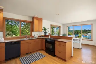 Open concept kitchen with clear fir cabinets