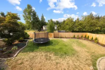 Fully fenced in with LOTS of room, the yard is perfect as it is, and can also be a blank canvas for you to create more!