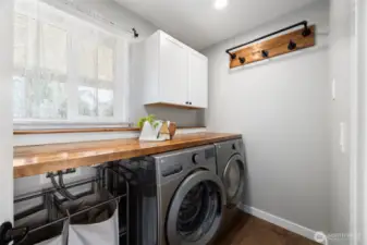You'll love the laundry/utility room, conveniently located at the front of the home, for all of your laundry and utility needs.