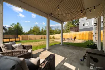 Enjoy evenings on the patio or around the firepit, with the fully fenced in back yard and refreshed landscaping.