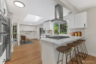 Create your culinary masterpieces in this brand-new and re-imagined kitchen. A huge skylight keeps it cherry and bright!