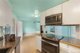 The kitchen has updated appliances and the dishwasher is new