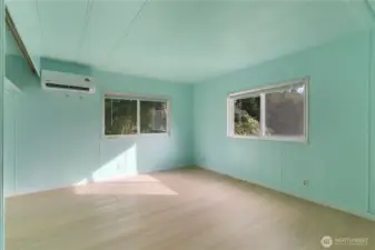 The primary bedroom and new mini split for heating and keeping you cool