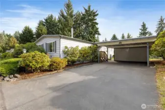 There is a two car carport and two storage sheds for storage and your projects